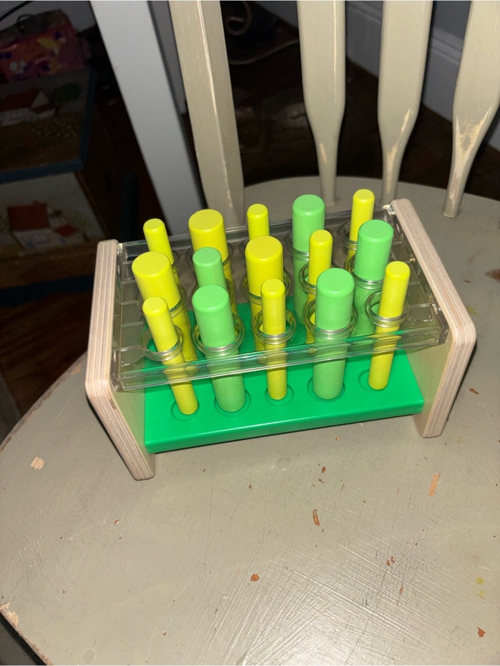 Wooden Peg Sorting and Stacking Toy in Green and Yellow - Early Learning